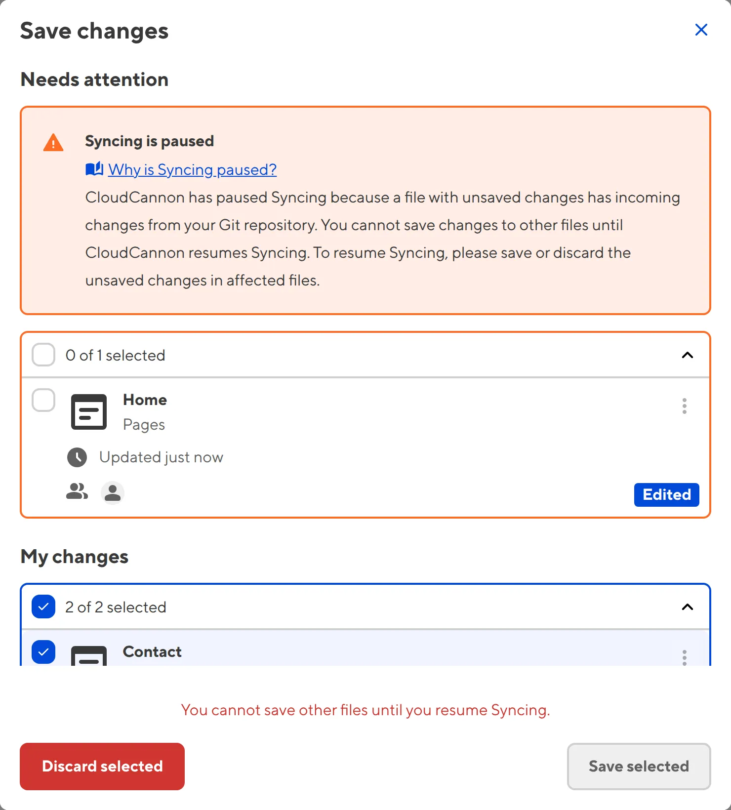 The Review Changes modal A screenshot of the Review Changes modal shows a Syncing is paused warning and affected files highlighted in orange.
