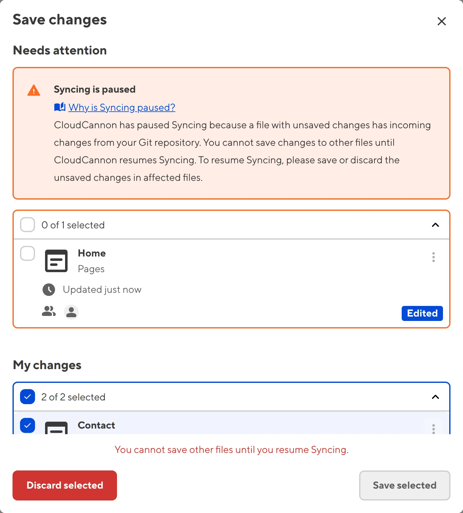 The Review Changes modal A screenshot of the Review Changes modal shows a Syncing is paused warning and affected files highlighted in orange.