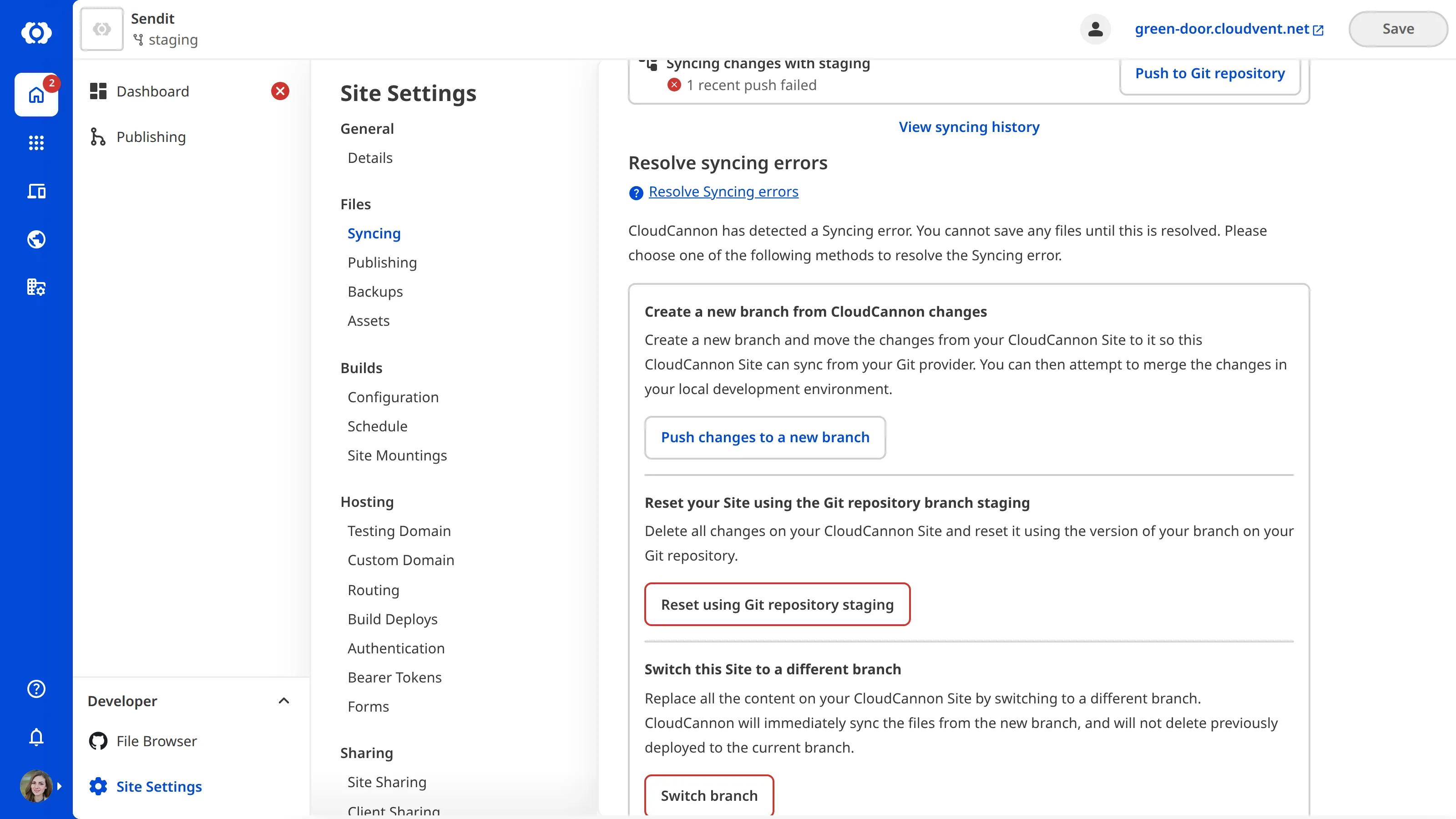 A screenshot of the Syncing page shows resolution options for a sync conflict, including creating a new branch, resetting from the Git repository, and switching to a different branch.
