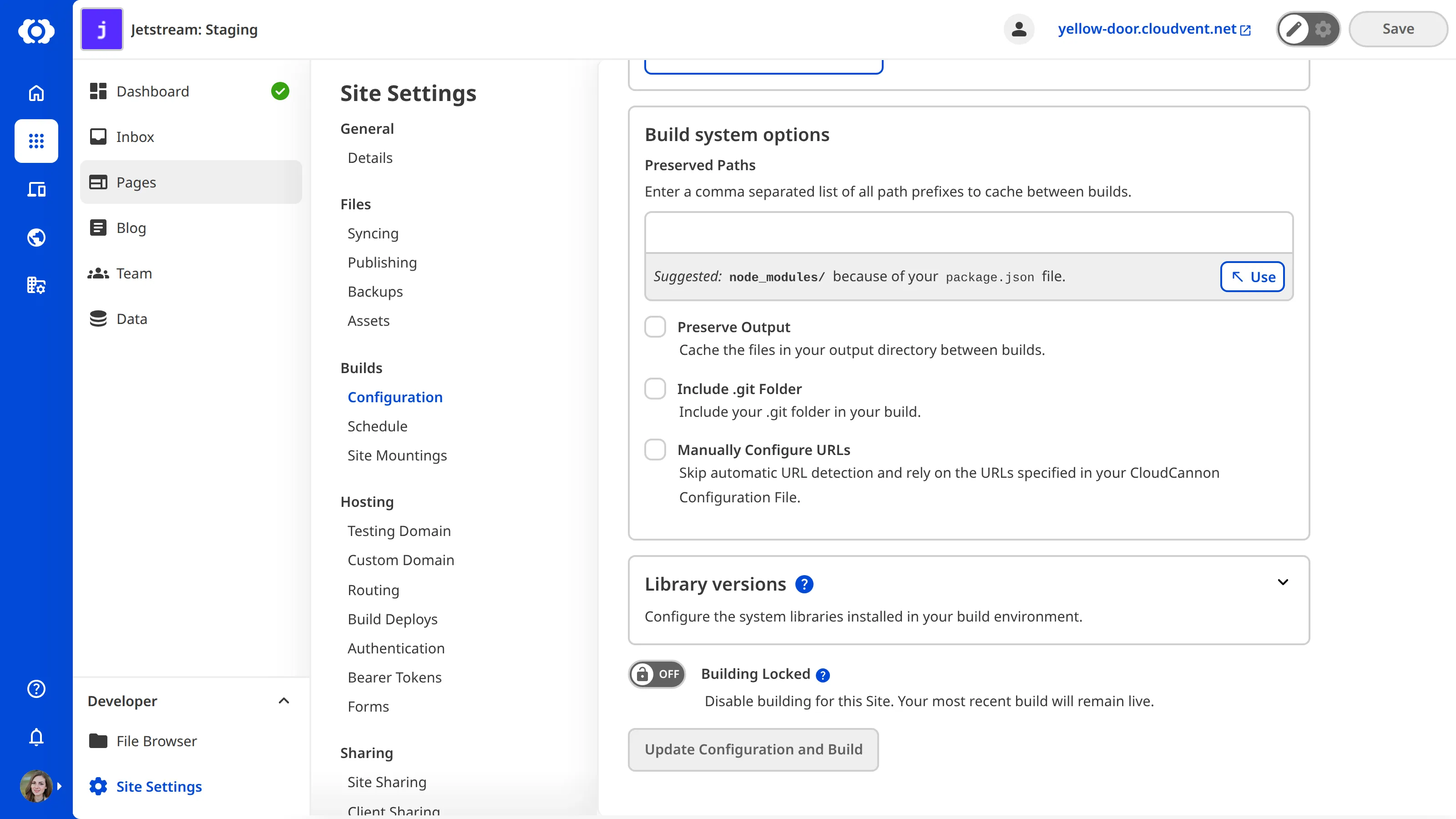 The Build Configuration page scrolled to the Build system options section, showing the Manually Configure URLs checkbox.