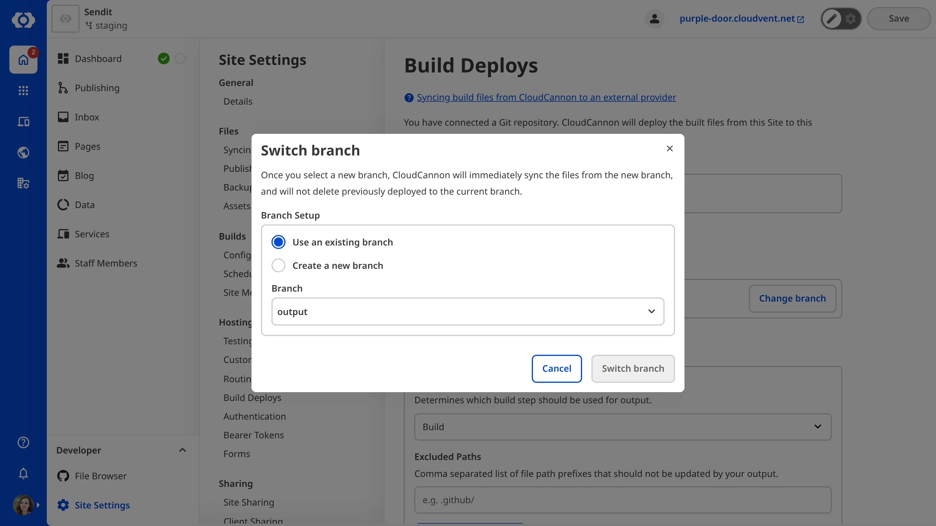 The Switch branch modal with a Branch dropdown and options to use an existing branch or create a new one.