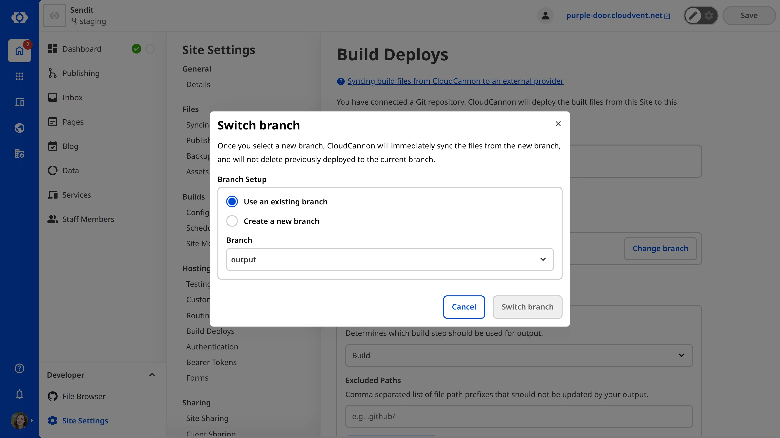 The Switch branch modal with a Branch dropdown and options to use an existing branch or create a new one.