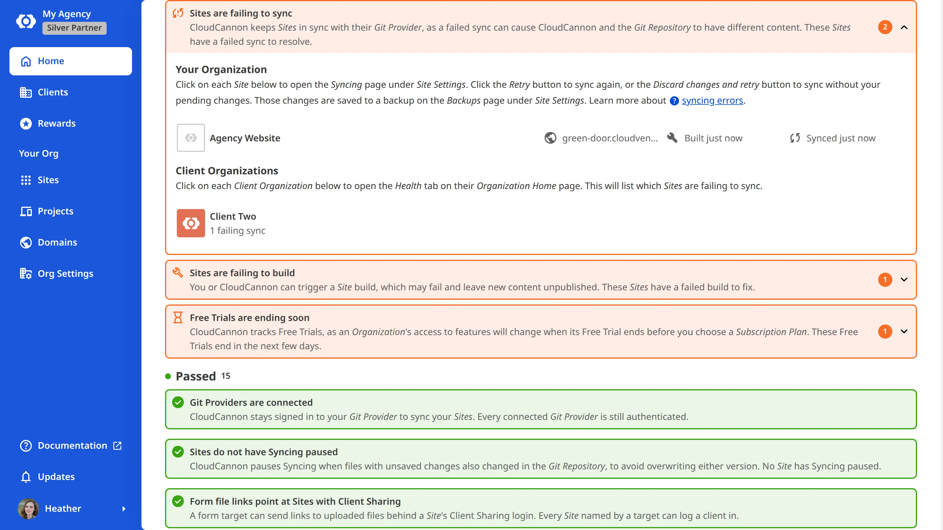 A screenshot of an expanded health check on the Health tab shows the affected Sites under Your Organization and the affected clients under Client Organizations.