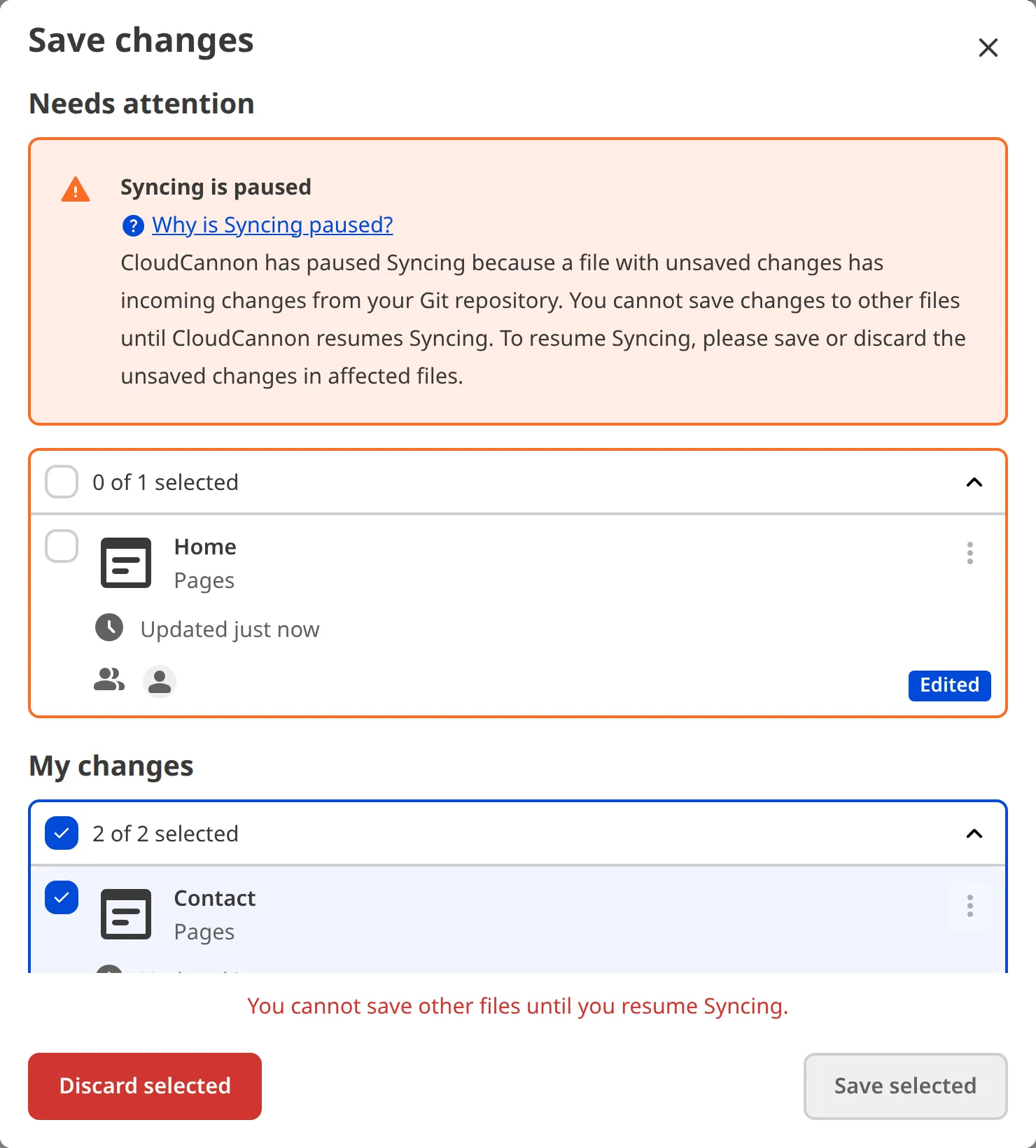 The Review changes modal shows the Needs attention heading with a Syncing is paused warning and an affected file.