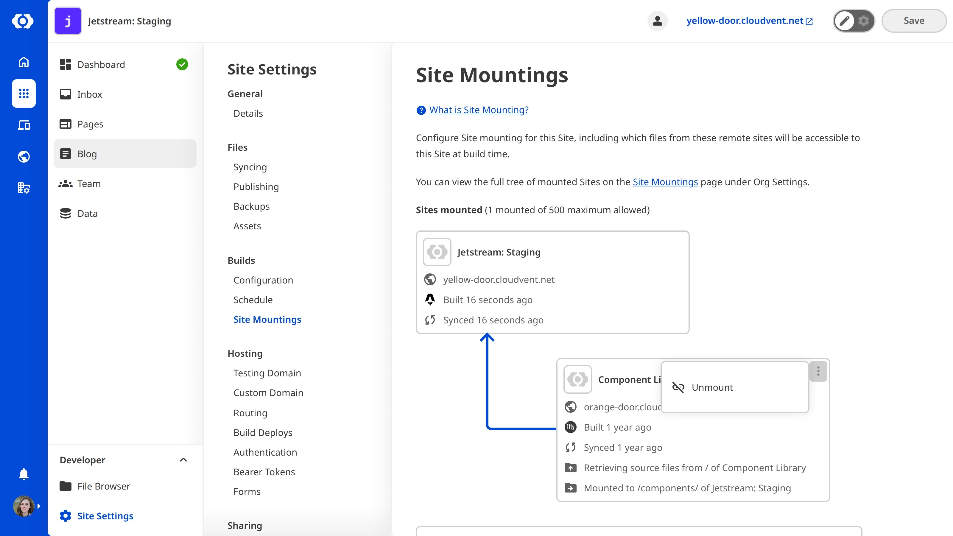 A screenshot of the Site Mountings page showing a mounted site with the context menu open, displaying the Unmount option.