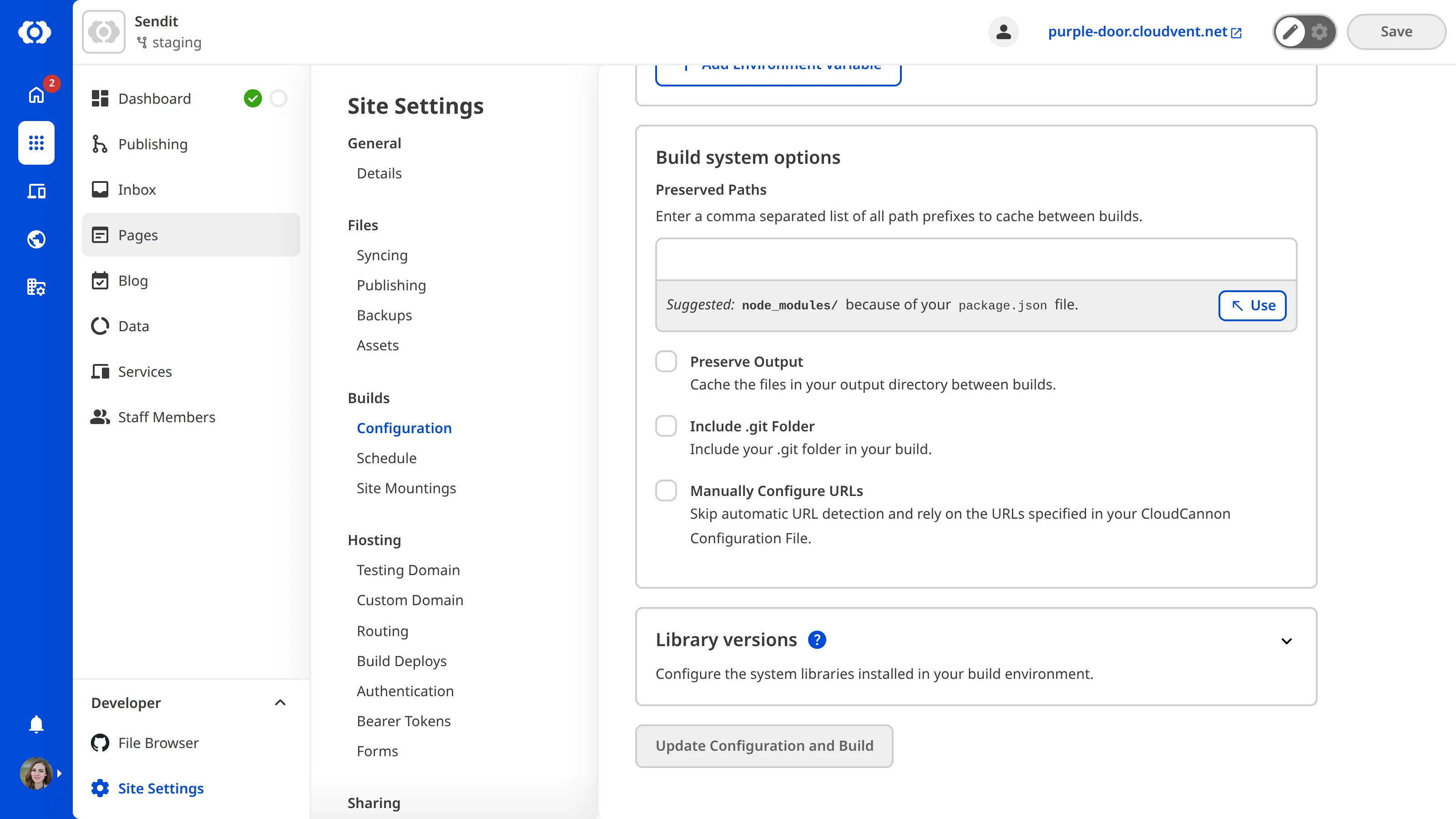 The Build Configuration page scrolled to the Build system options section, showing the Manually Configure URLs checkbox.