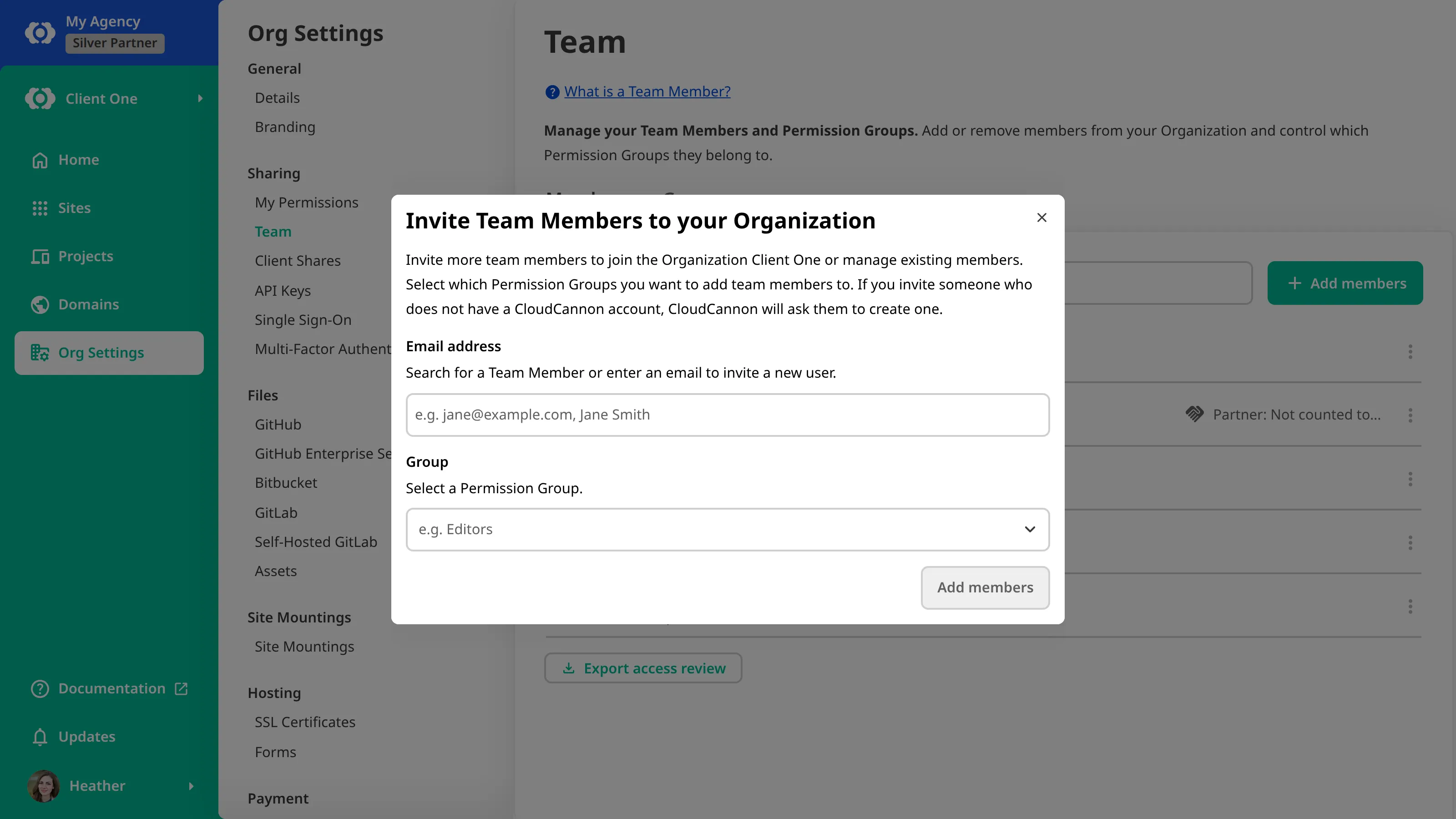 A screenshot of the Invite Team Members modal in a Client Organization shows fields for an email address and a Permission Group, above the Add members button.