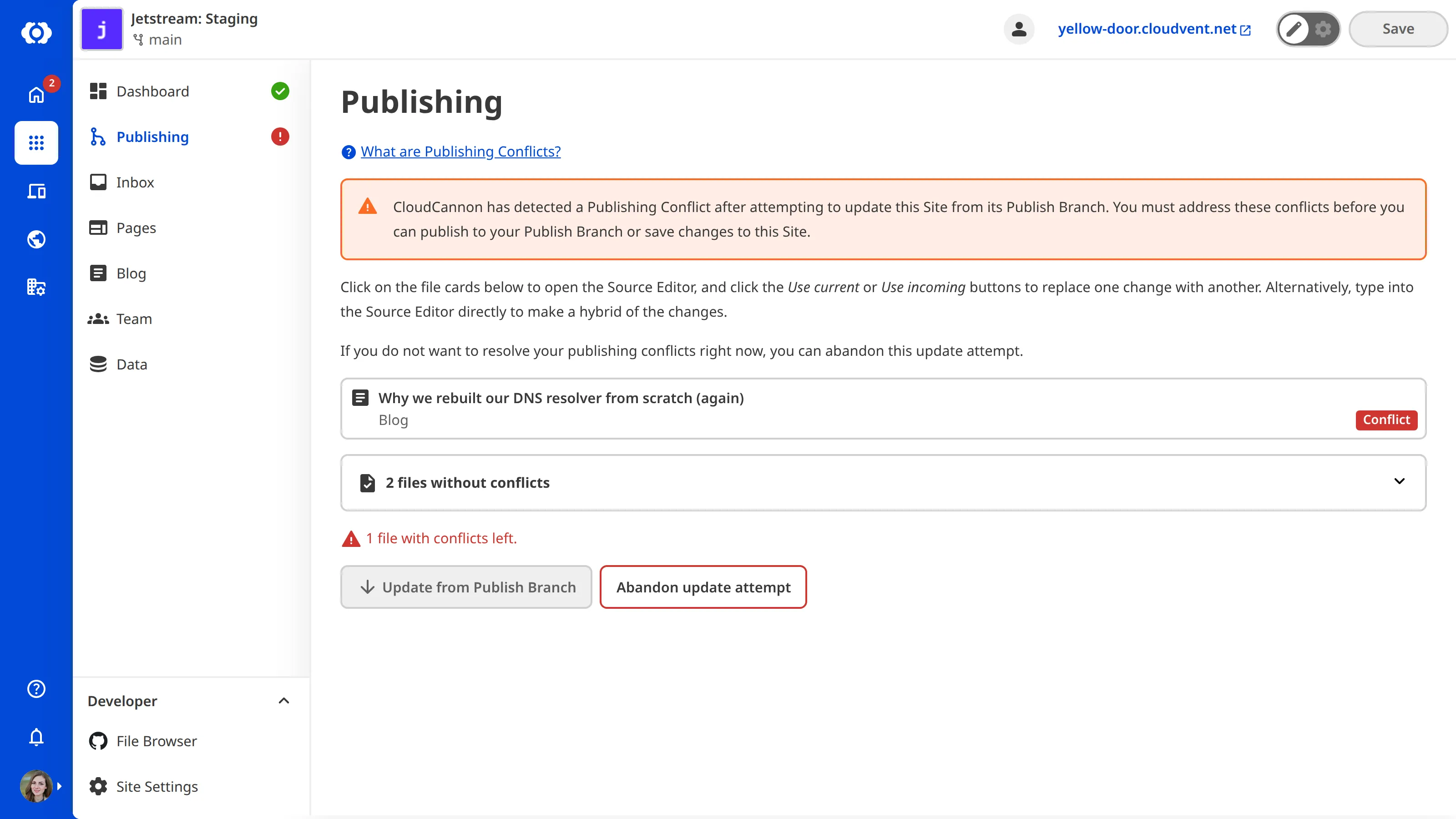 Publishing Conflict with one file resolved A screenshot of the Publishing page shows one conflicted file marked as resolved, with a second conflicted file still to resolve.