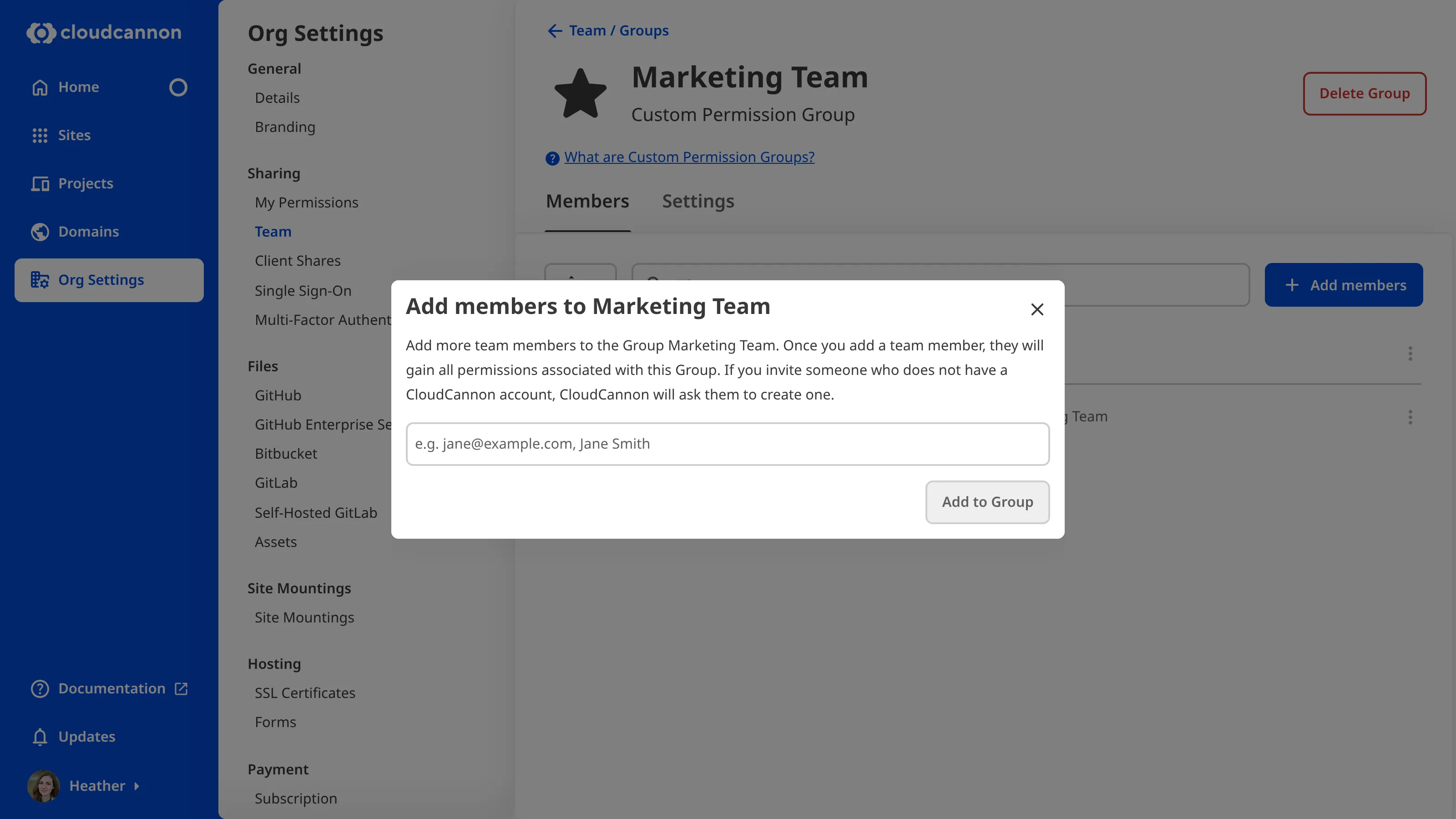 The Add Team Members to Group modal A screenshot of the Developers Permission Group page shows the Add Team Members to Group modal with a field for names.