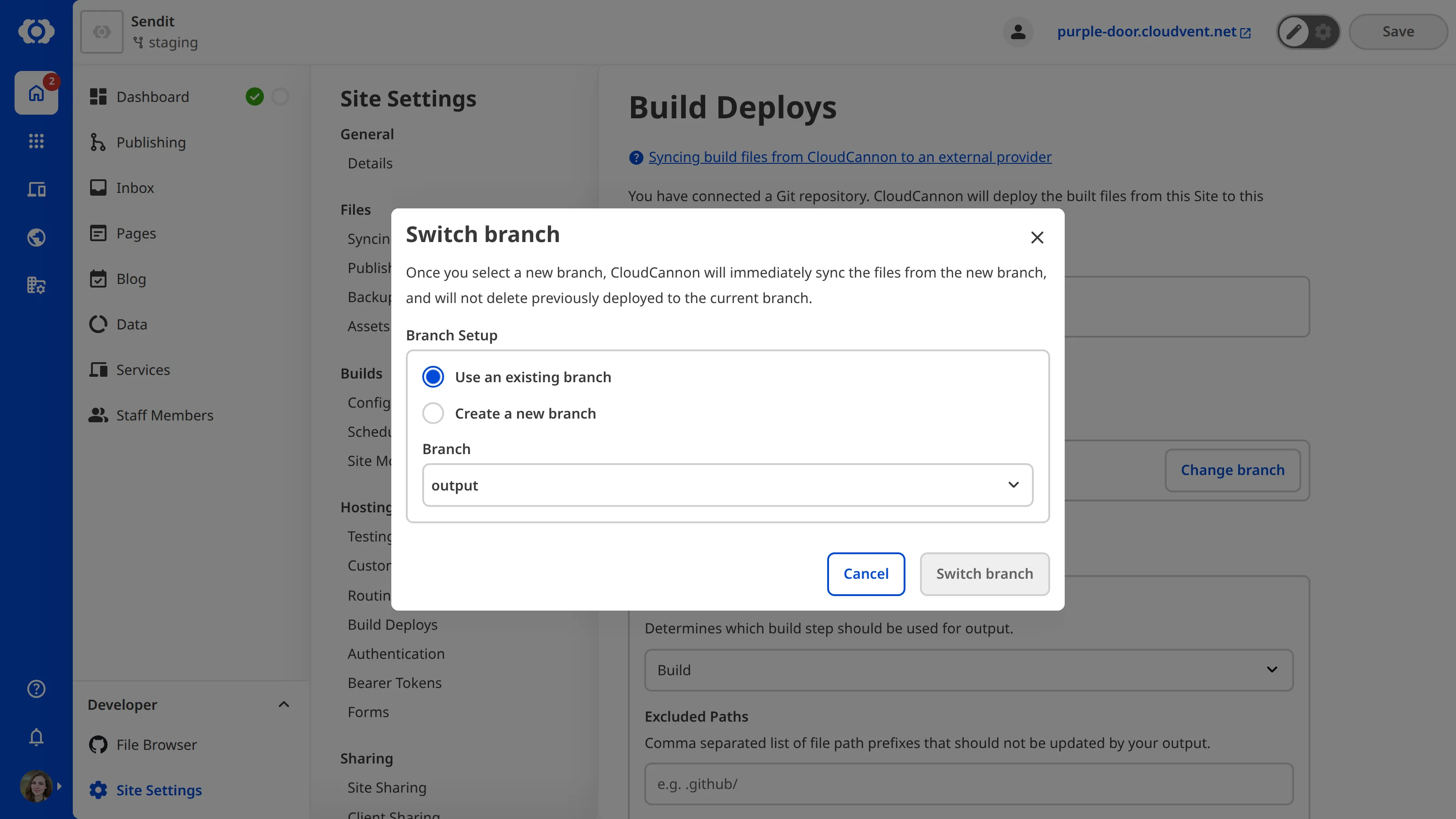 The Switch branch modal with a Branch dropdown and options to use an existing branch or create a new one.