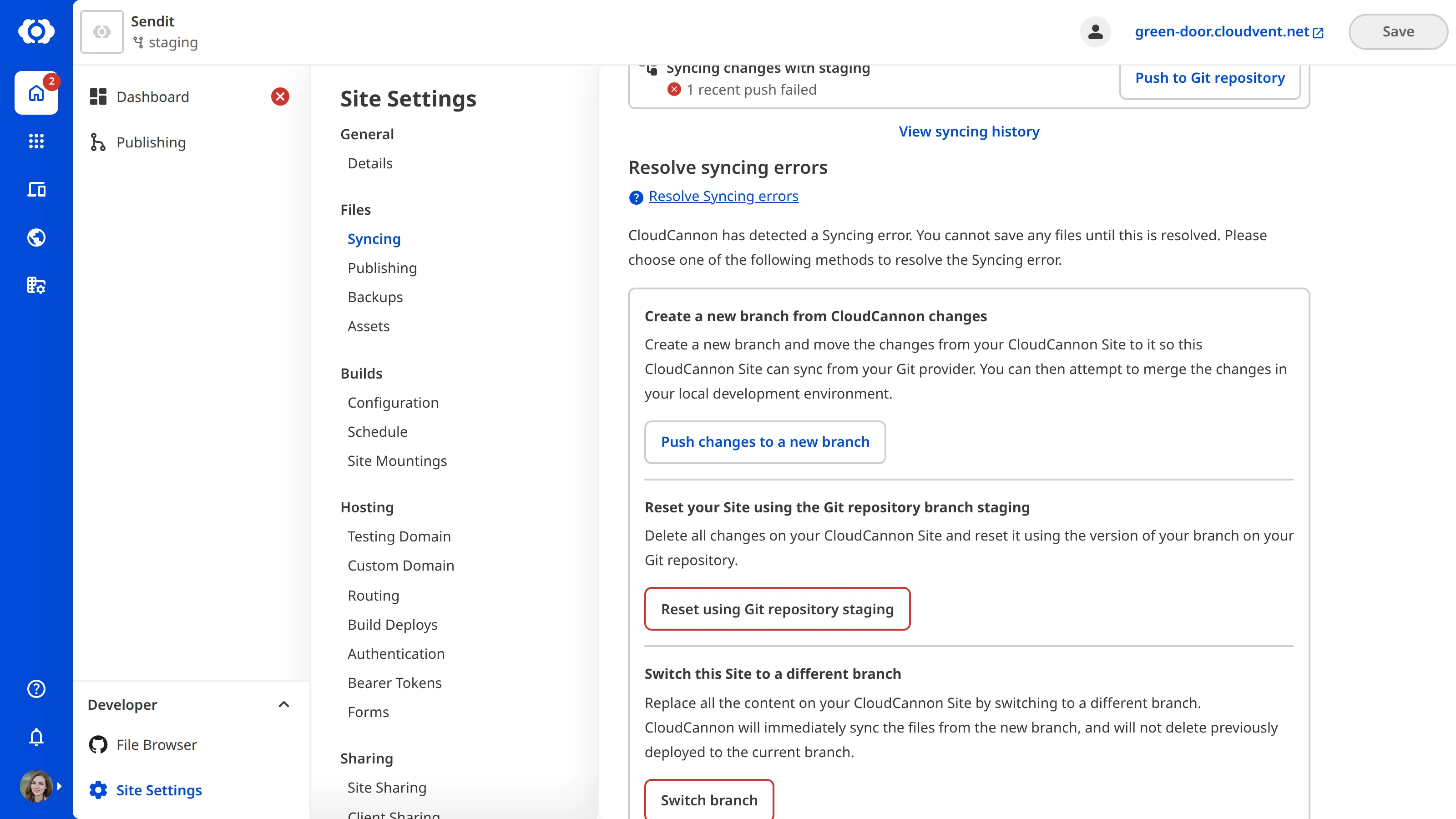 A screenshot of the Syncing page shows resolution options for a sync conflict, including creating a new branch, resetting from the Git repository, and switching to a different branch.