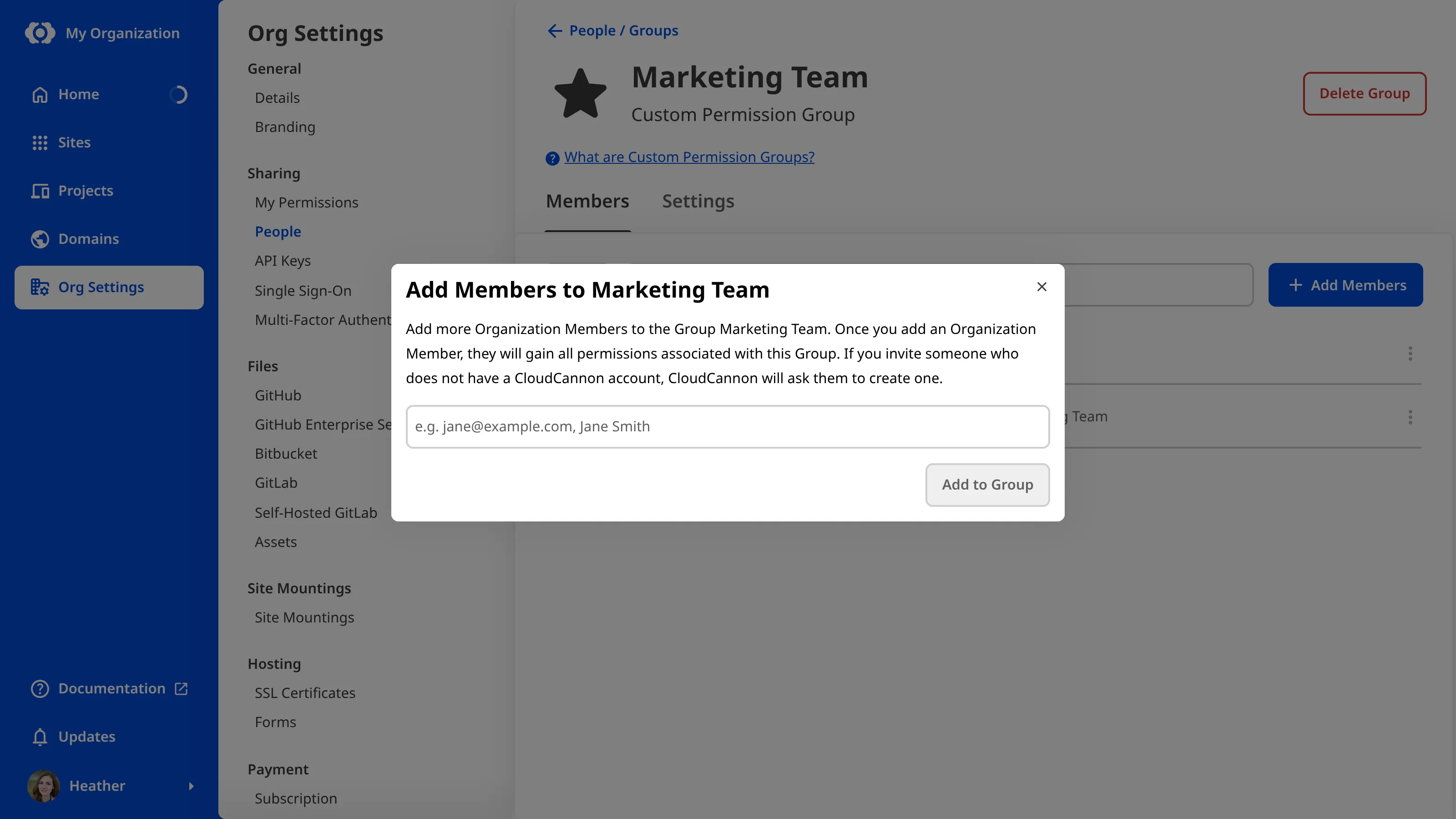 A screenshot of the Marketing Team Permission Group page shows the Add Members to Marketing Team modal with a field for names and email addresses.